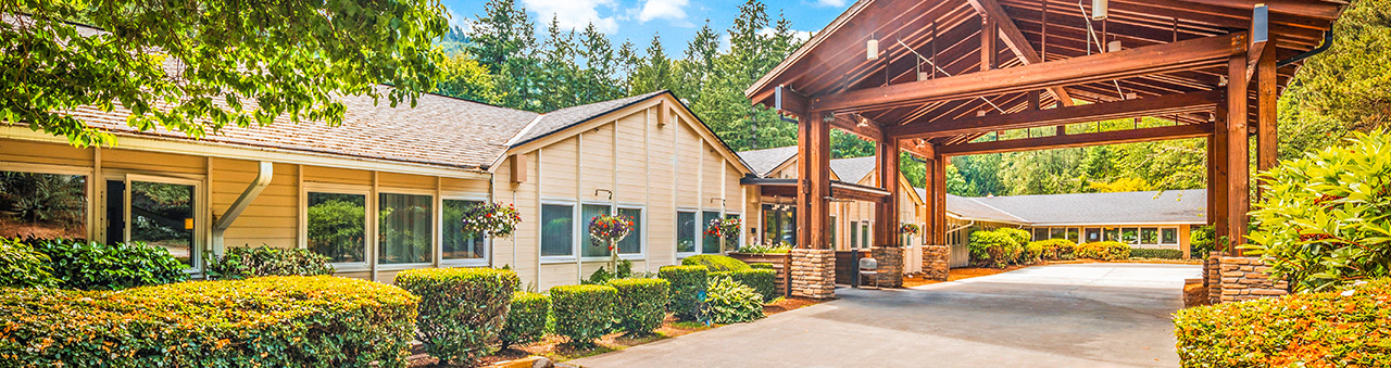 Issaquah-Rehab-Building Avamere Nurse Holding Elderly Patients Hands Mobile